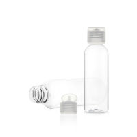 Transparent 2oz clear pet plastic bottle with white 20/410 flip top cap